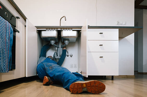 Professional Drain Cleaning technician working in Dexter, MI